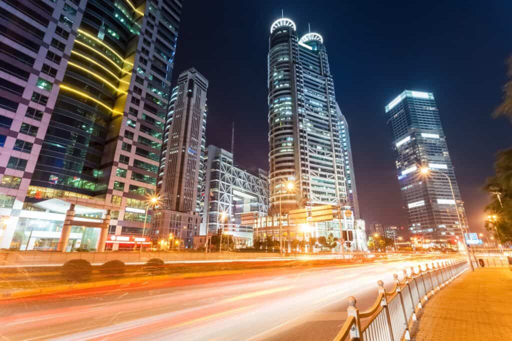 glow city road with modern buildings